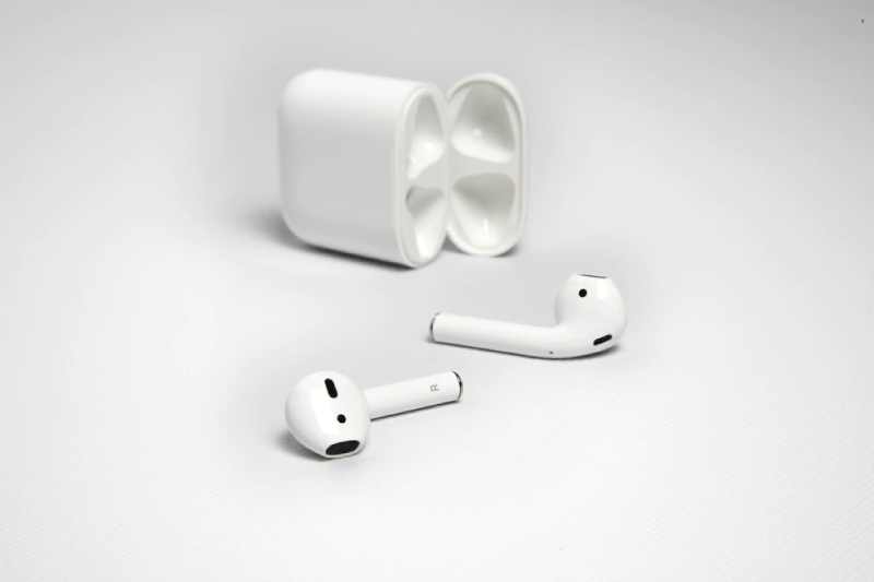 closeup shot white wireless headphones with their case white background 181624 31412